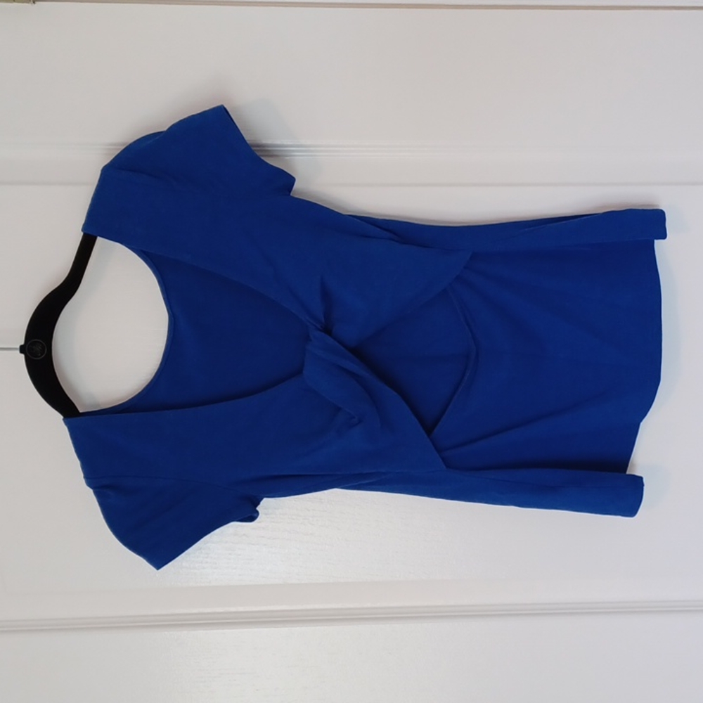 Business in the front, sexy in the back!  Open back, cut out top